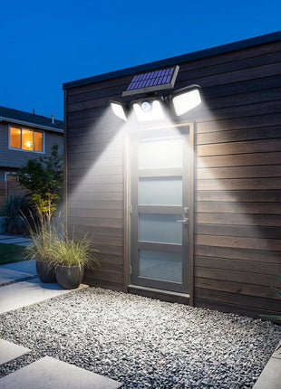 Luz solar LED exterior com sensor de movimento, projetores acesos junto à entrada