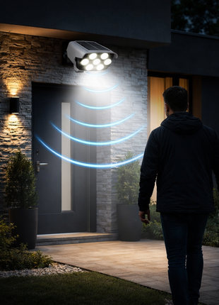 Luz solar de segurança acesa com painel solar, LEDs e sensor para entrada