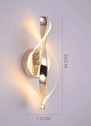 Aplique de parede LED dourado em espiral, com placa circular e dimensões 12x30 cm.