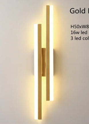 Aplique de parede LED minimalista dourado com barras verticais iluminadas