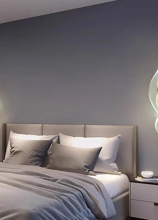 Conjunto de apliques de parede LED dourados em espiral, com luz suave para quarto.