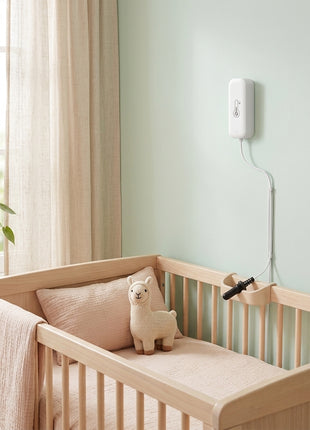 Sensor Tuya de temperatura e humidade branco com cabo, junto a berço