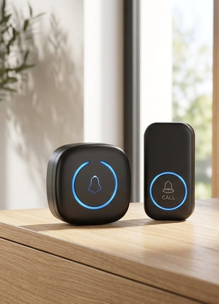 Campainha sem fios Wi‑Fi preta, botão na parede com luz azul e unidade compacta.